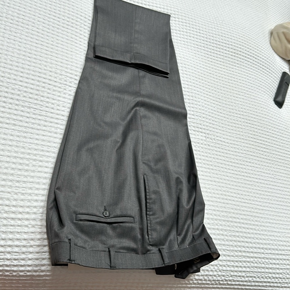 Men’s dark grey slacks cuffed